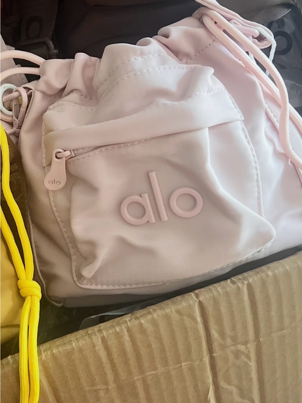 ALO Yoga Mini Drawstring Bucket Bag in Pale Pink